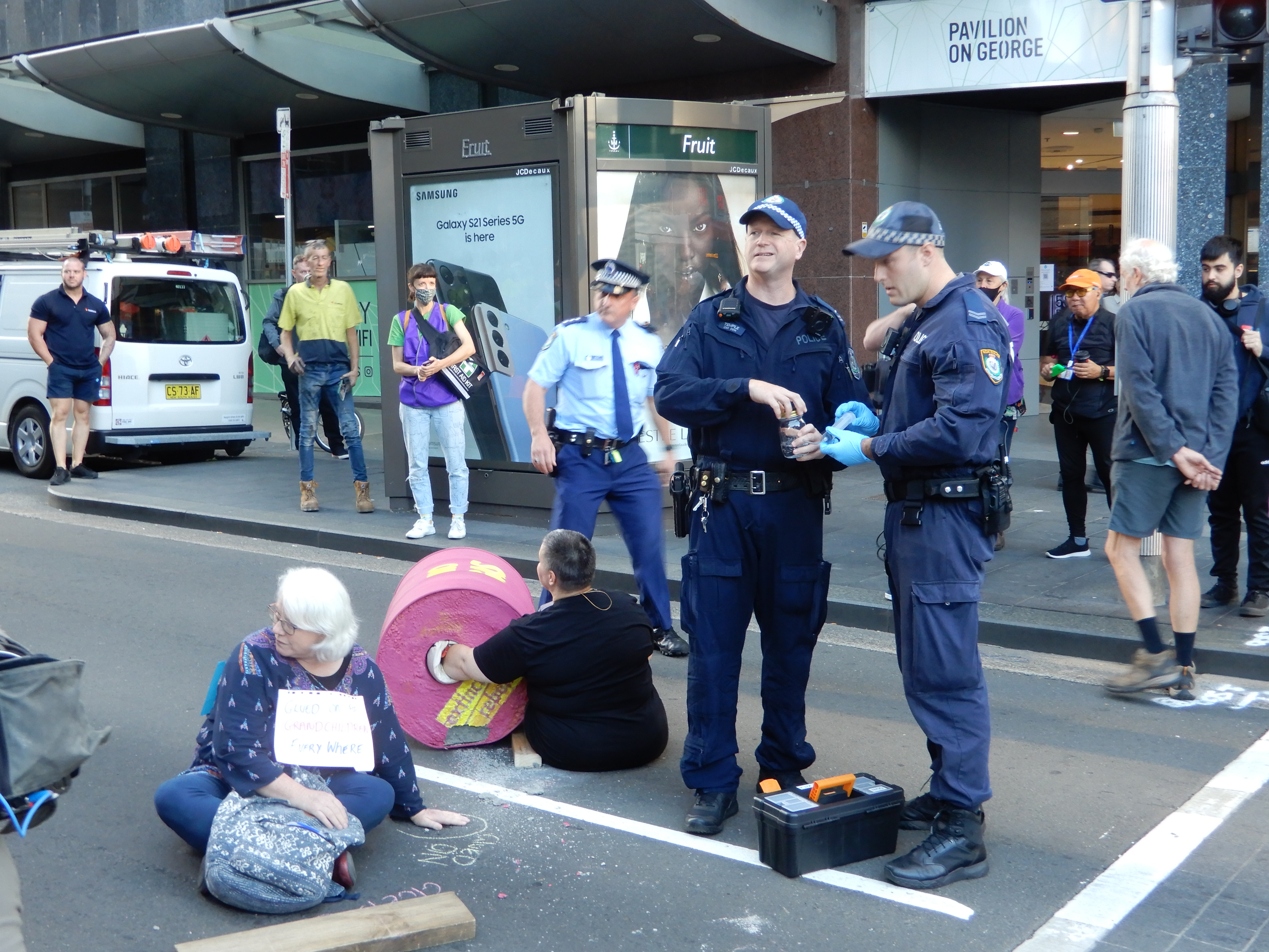 Police officers prepare to unstick Lesley