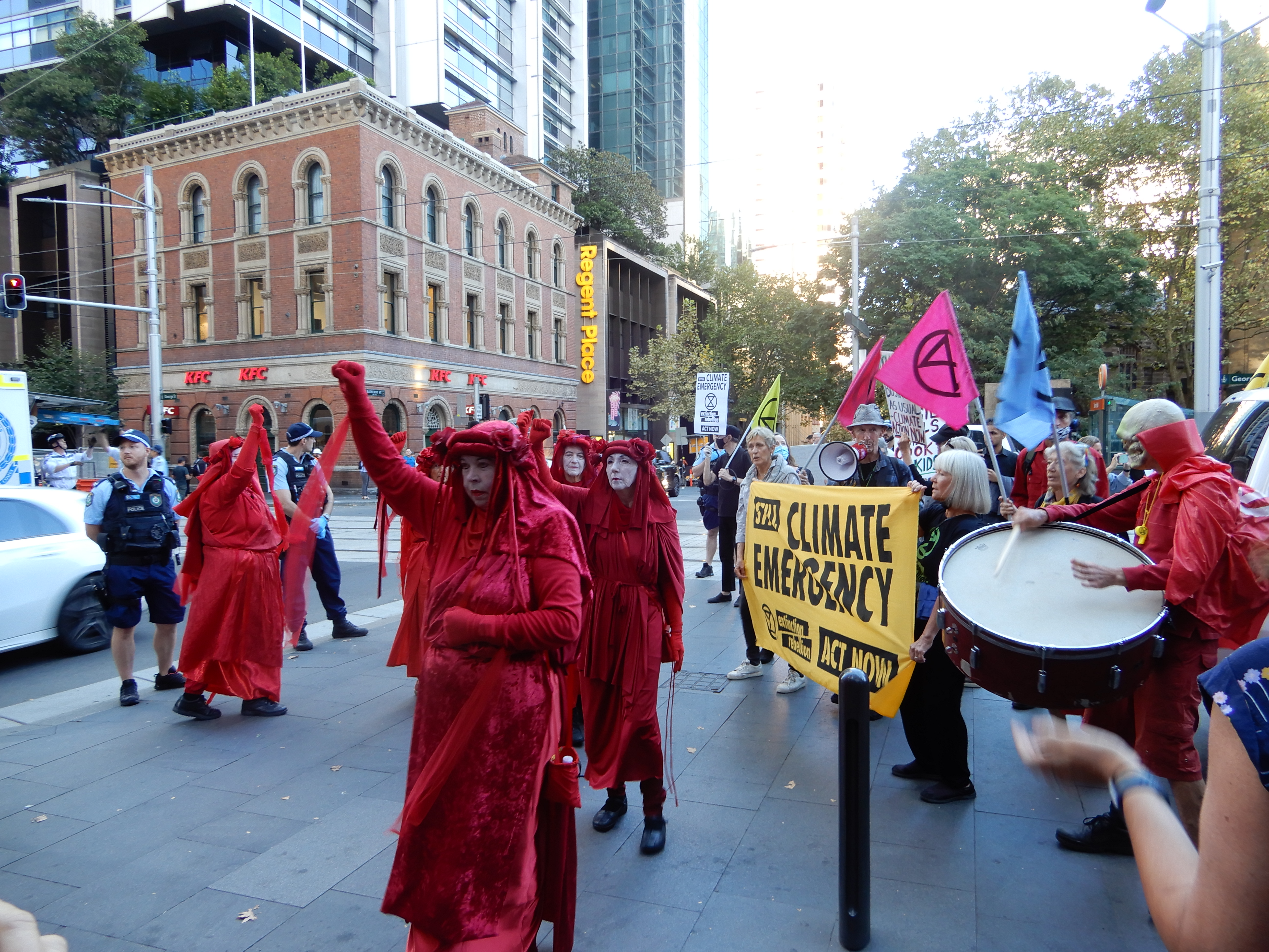 XR activists protest beside the nonviolent direct action