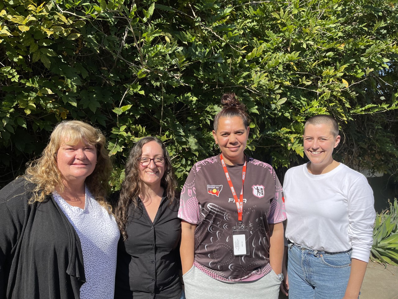 The Miranda Project team, which includes a senior case worker, program manager, case worker and project worker. Marisa is second from the left