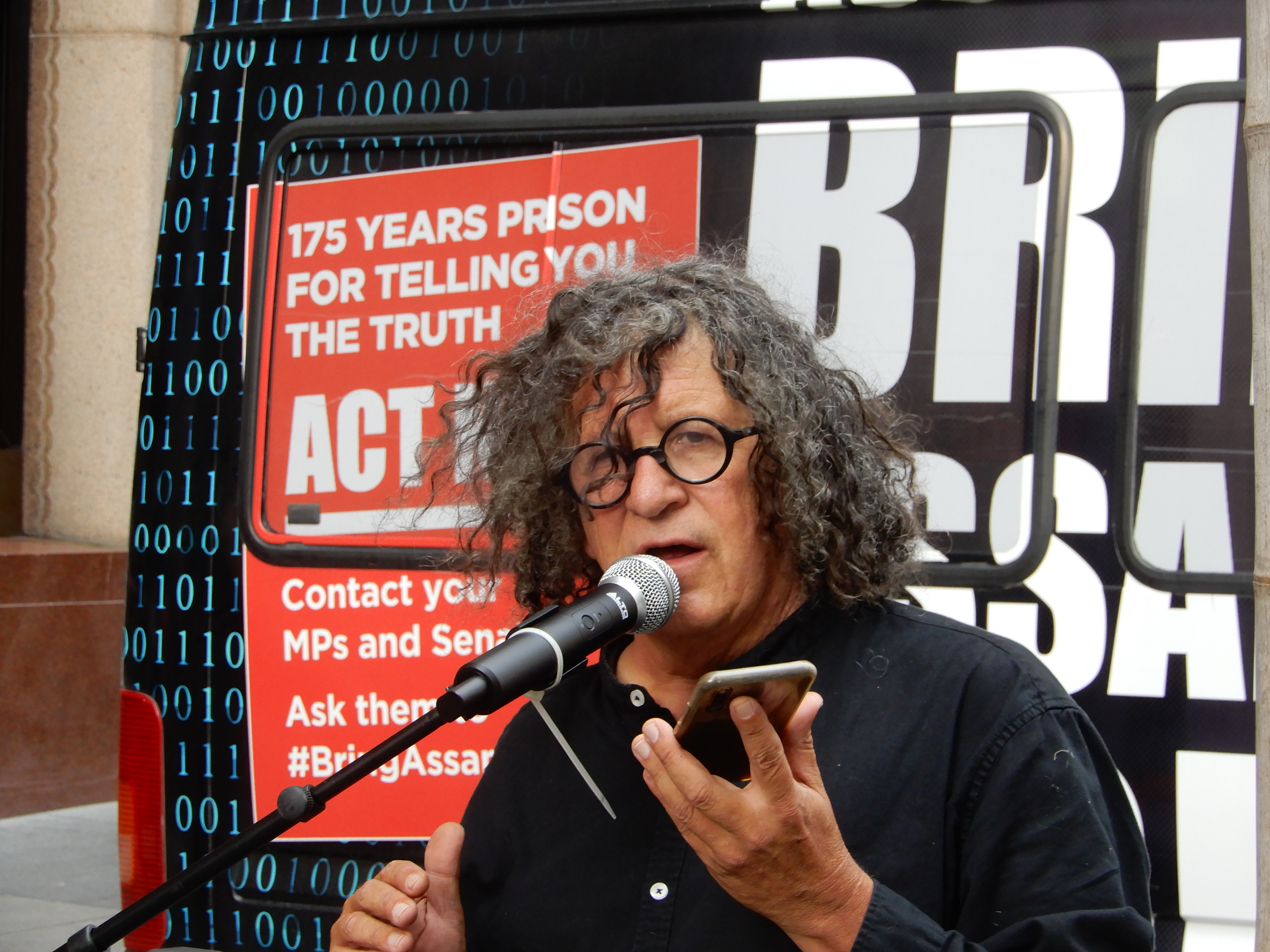Antiwar campaigner Jacob Grech speaks at the Home Run for Julian rally in Sydney’s Martin Place in March 2021