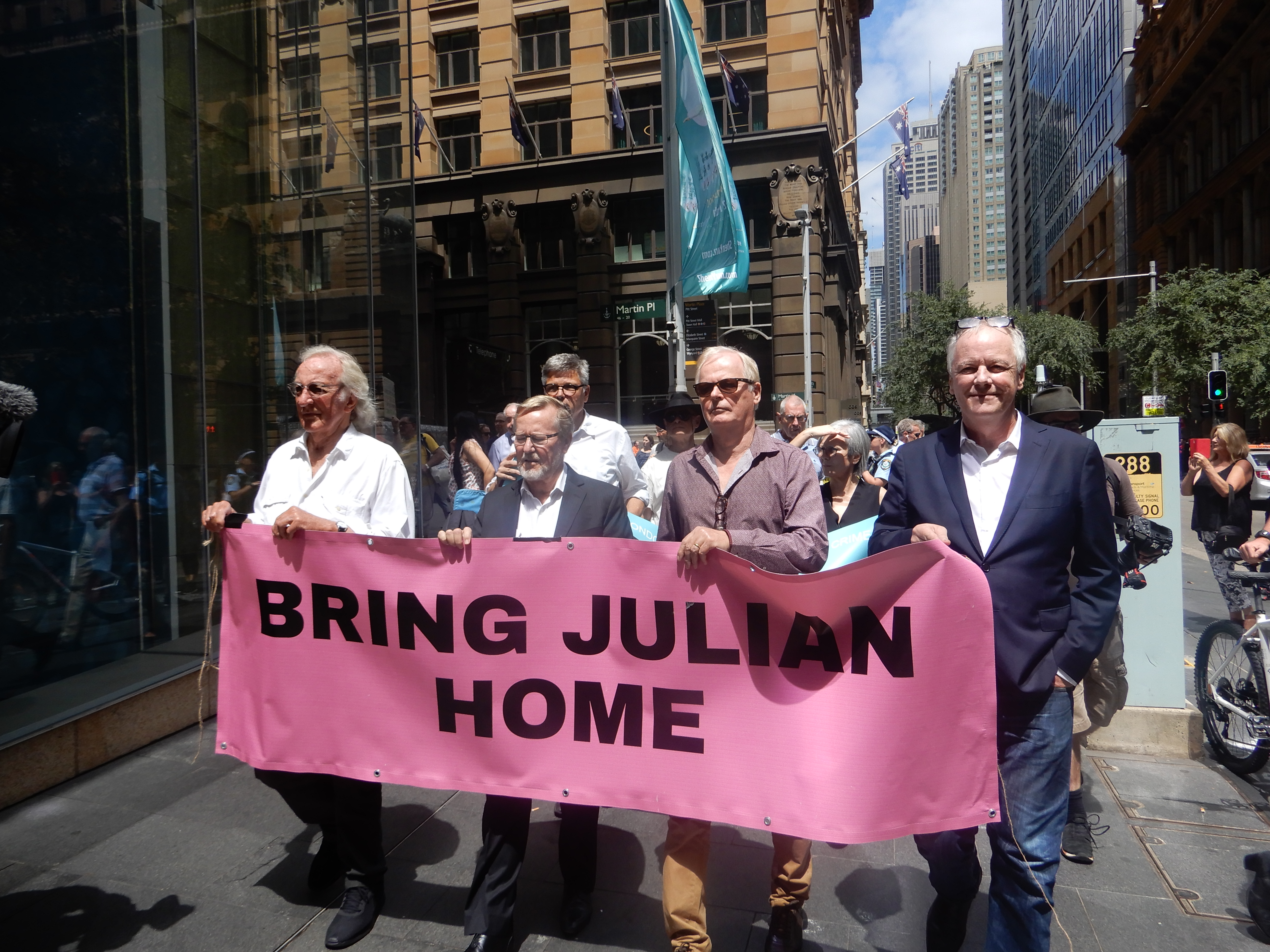 Fellow Australian journalists John Pilger, Quentin Dempster, Andrew Fowler and Mark Davis rally in support of the Wikileaks founder