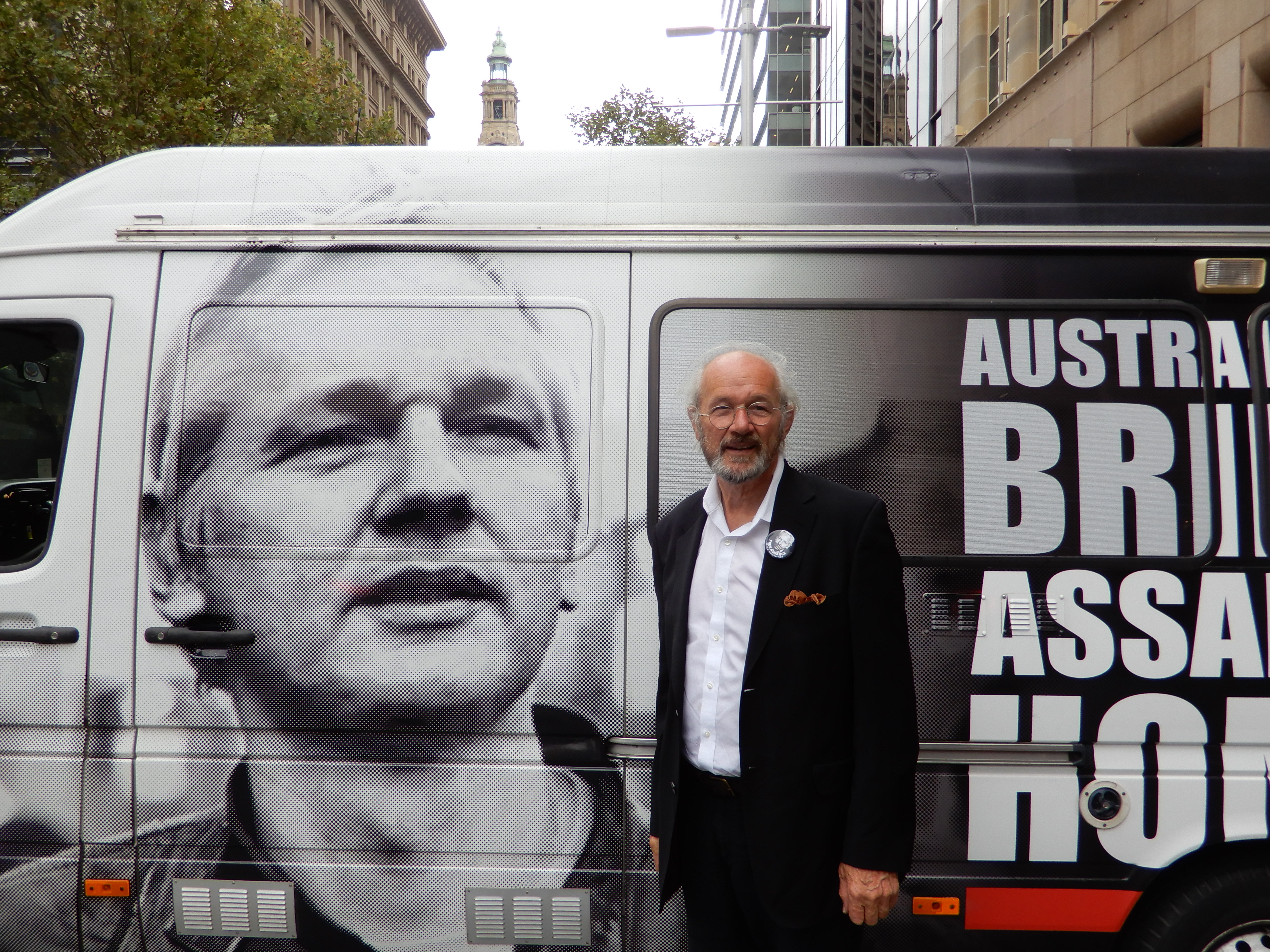 John Shipton alongside the Home Run for Julian van in Sydney’s Martin Place