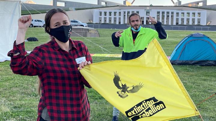 Sergeio occupies the lawns of parliament as part of an Extinction Rebellion action