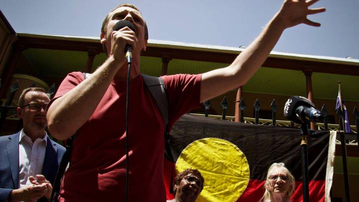 UTS Jumbunna Institute researcher Padraic Gibson addresses a Grandmothers Against Removals protest in Sydney. Photo credit Melbourne-based movement photographer Charandev Singh