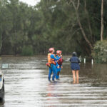 Inmates Build Homes for Flood Victims