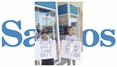 Gomeroi women Aunty Deborah Briggs and Aunty Suellyn Tighe protest outside local Santos office