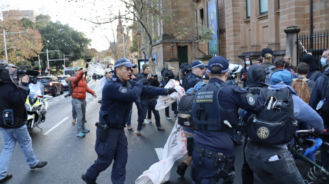 Policing climate defenders in Sydney’s CBD in late June