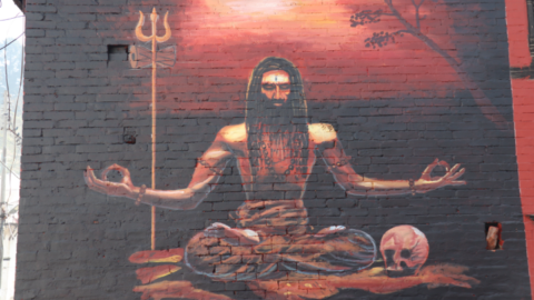 A painting of an aghori. Followers of Shiva, the aghori are an unorthodox sect of sadhus that practice tantra. They hang around the burning grounds, are known to smear their bodies in the ash and use human bones to craft objects like bowls.
