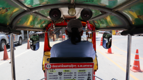 Sitting in back of a doorless tuk-tuk is the only way to fly