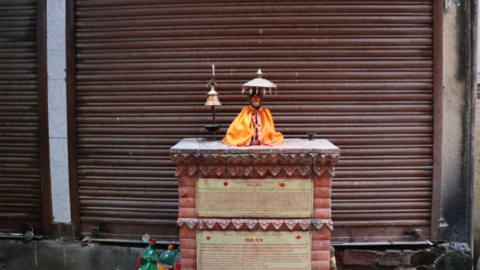 A small shrine to Hanuman, the monkey god, on the side of a road