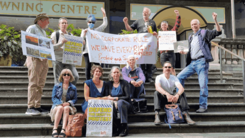 Violet Coco amongst her supporters earlier today at the Downing Centre Courthouse