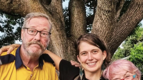 Volunteer firefighter Alan Glover with climate defender Violet Coco 