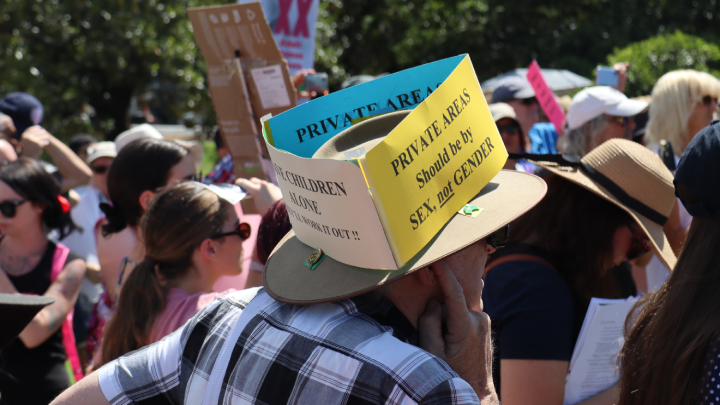 One of Keen’s supporters expressing his opinion about “private areas” on a hat placard