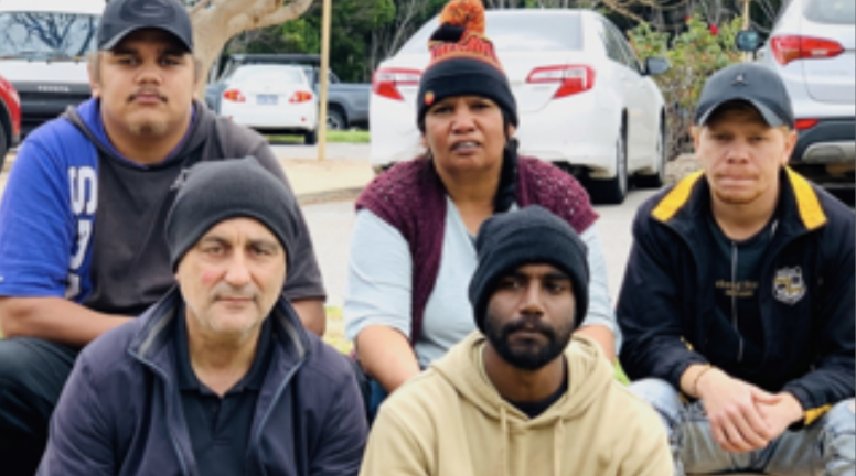 Megan Krakouer and colleague Gerry Georgatos with some young men who were formerly detained at Banksia Hill and are now seeking compensation 