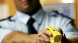 Taser held by a man