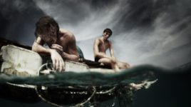 Men stranded on a boat