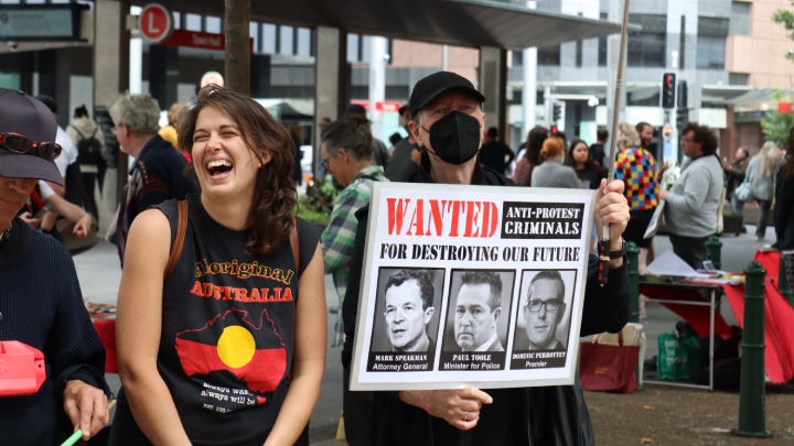 Violet Coco at a December 2022 protest in Sydney calling for the charges against her to be dropped