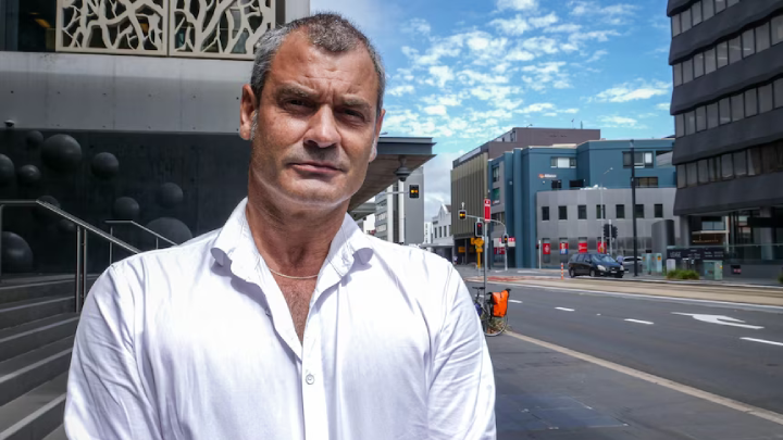 Photo of the writer outside of Newcastle Local Court has been borrowed from the ABC. Photo credit journalist Keira Proust