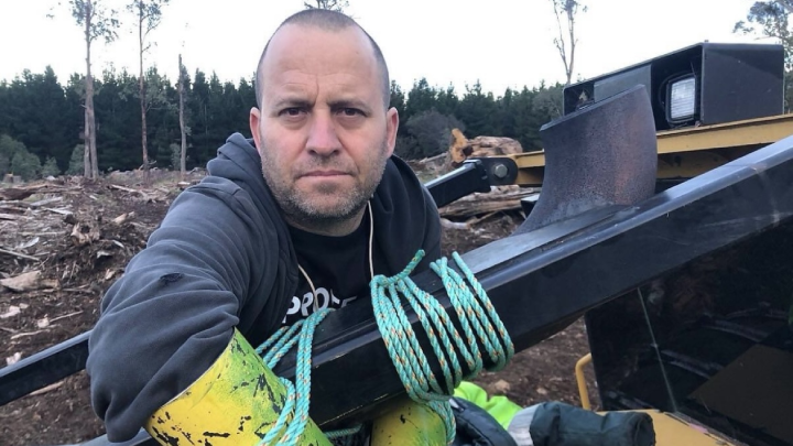 Climate defender Brad Homewood locking on as part of a Bob Brown Foundation nonviolent direct action last month in Tasmania