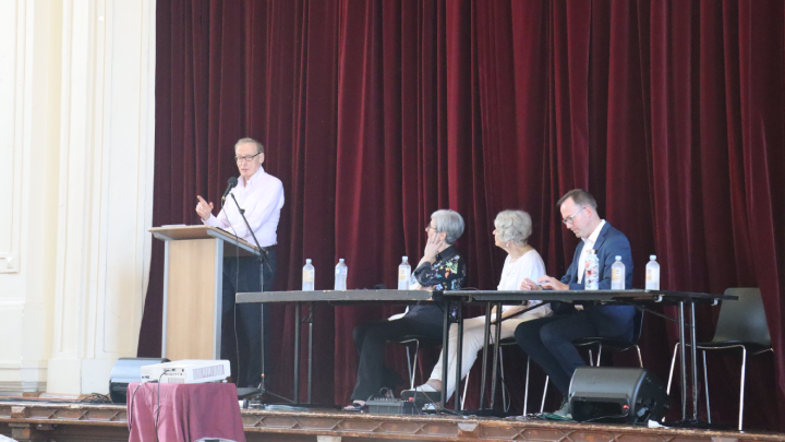 Former foreign minister Bob Carr addresses the Marrickville meeting, with journalist Mary Kostakidis, AWPR's Dr Alison Broinowski and Senator David Shoebridge to his side