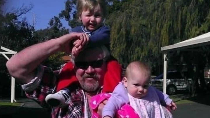 Stephen Pokrywka with two of his children