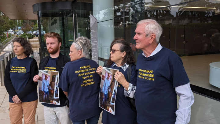 Todd McKenzie’s family outside the courthouse on the day the coronial inquiry findings into his death were handed down