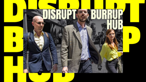The Disrupt Burrup Hub trio facing court this Friday. Gerard Mazza is speaking to the press, as Jesse Noakes is behind him, and Tahlia Stolarski is to his side