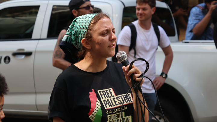 Yasmine Johnson, a member of Students for Palestine, led those marching in a chant. Johnson, a Jewish student, represented Students for Palestine at the Royal Commission into Antisemitism hearings Yasmine Johnson, a member of Students for Palestine, led those marching in a chant. Johnson, a Jewish student, represented Students for Palestine at the Royal Commission into Antisemitism hearings