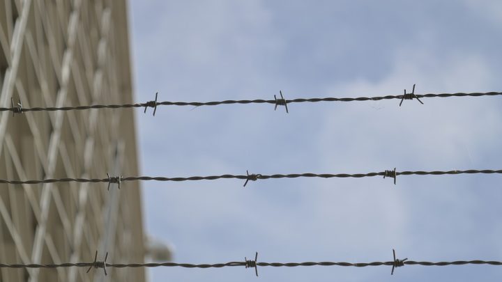 Wire tied on fence