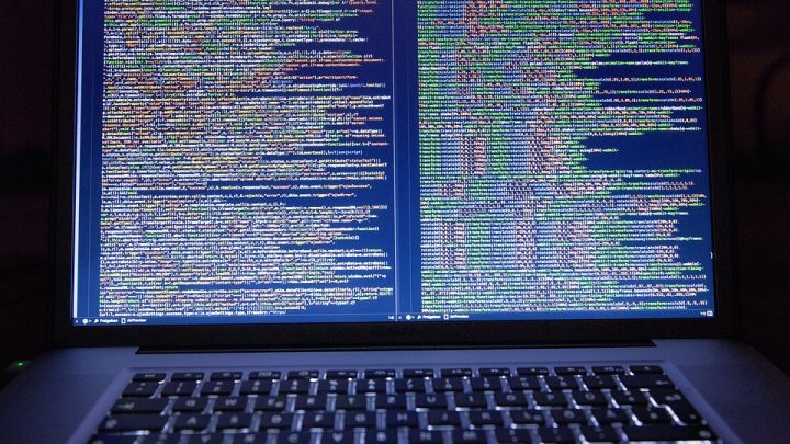 Code displayed on laptop