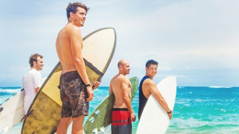 Surfers beach and surfboards