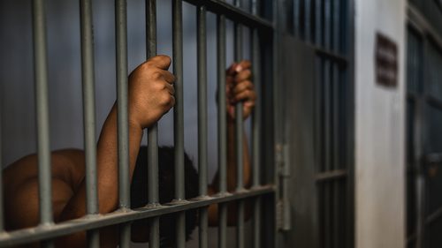 Black man in prison